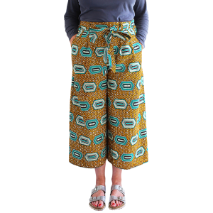Fiona modelling the Elsie trousers, in a cotton fabric with a vibrant mustard yellow African print